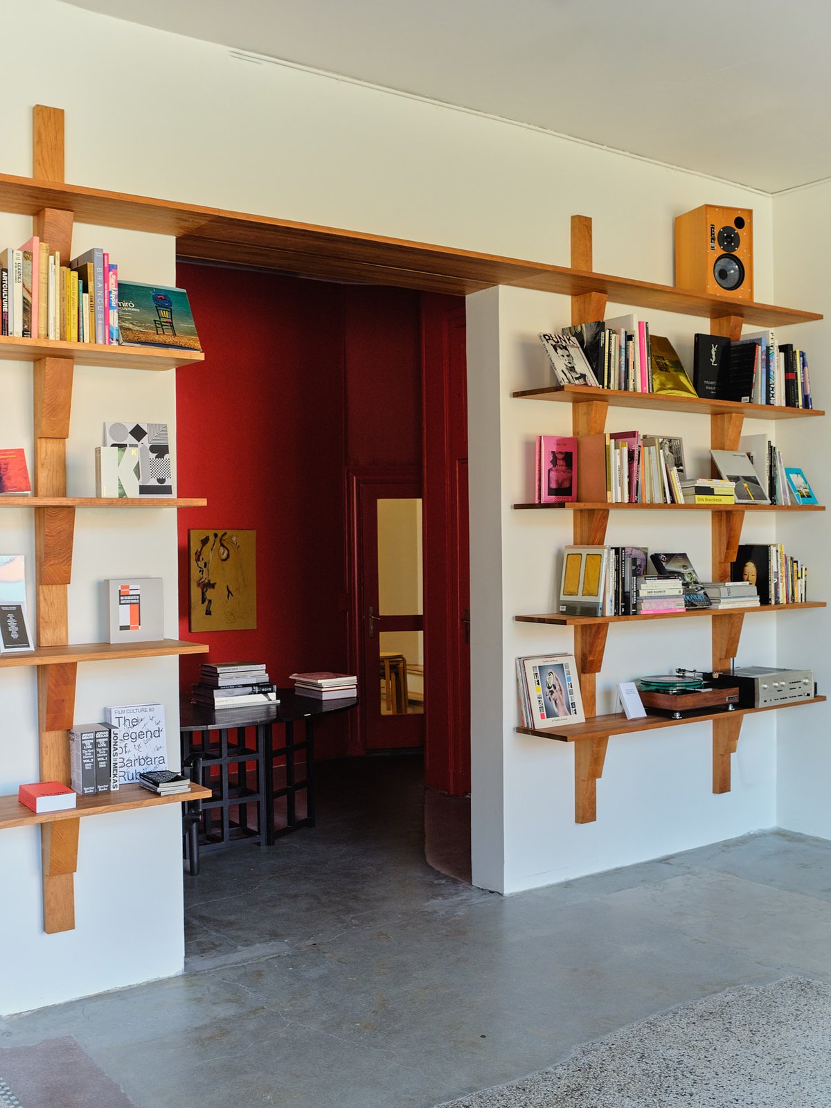 Through the shelving to the Red Room. Photo Armin Tehrani