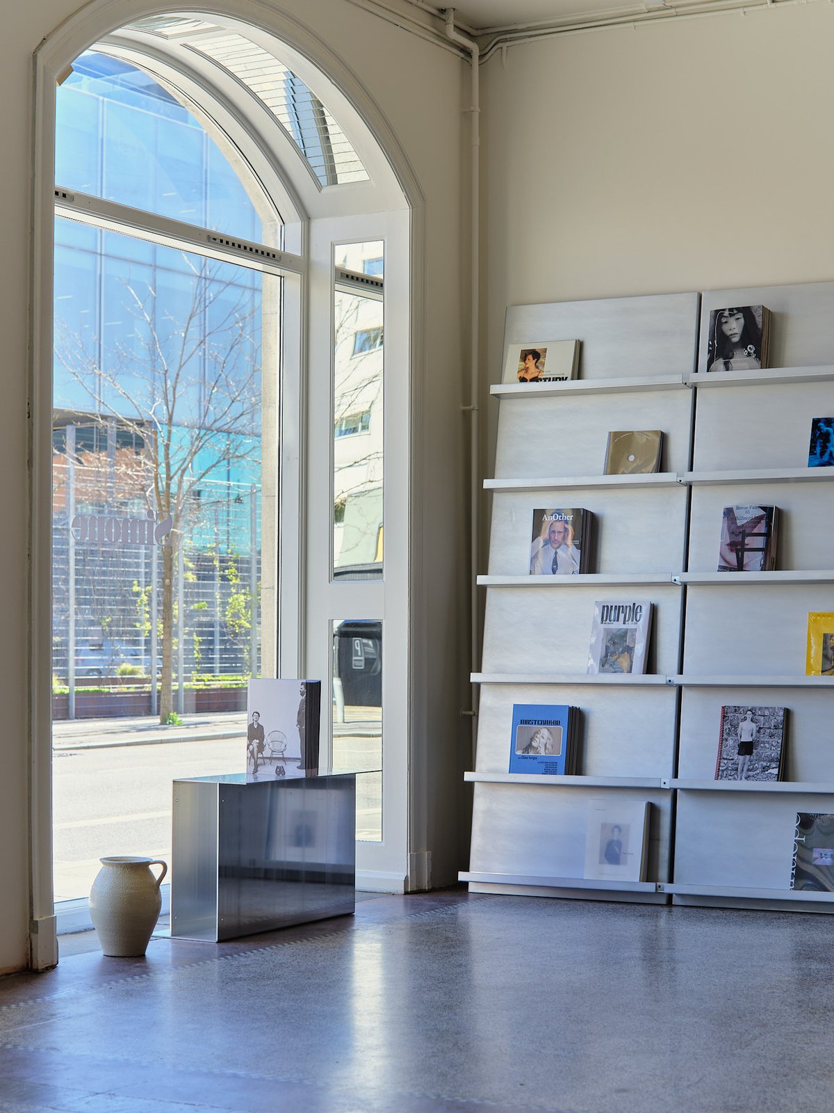 The magazine wall at the storefront, aluminium display by Kasper Kyster. Photo Armin Tehrani
