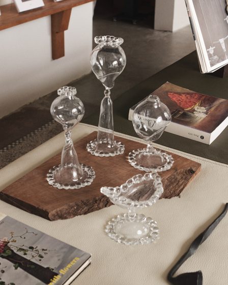 Display / Displayed, glass and books