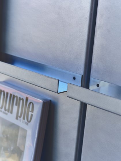 Simone Magazine Displays by Kasper Kyster, raw aluminium and black bolts
