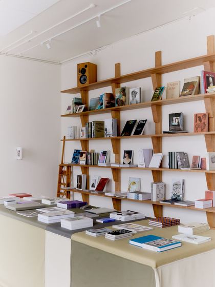 Cherry wood shelving and the leather counter. Photo Staffan Sundström