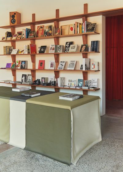 The cherry wood shelving and the leather counter. Photo Armin Tehrani